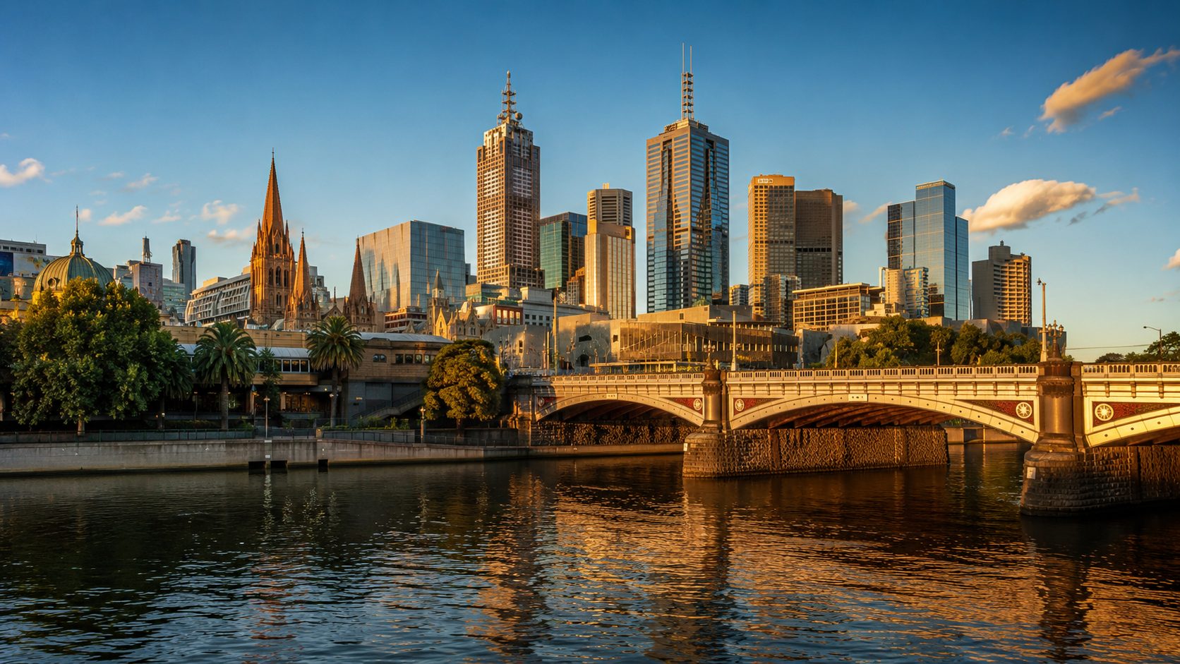 The Melbourne CBD skyline and Princes Bridge across the Yarra River at golden hour